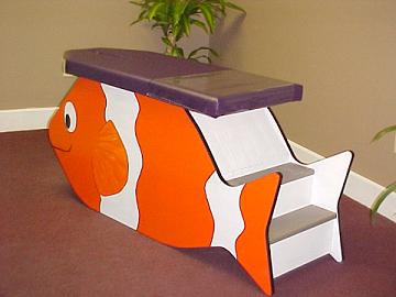 little fishy kids chiropractic table