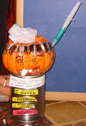 pumpkin head with medication and syringes