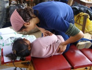chiropractic adjustment Peru earthquake children